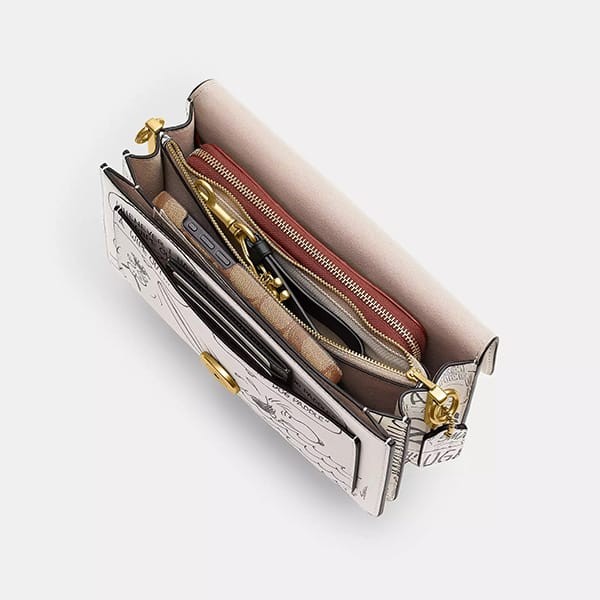 スヌーピー限定コラボ【コーチ】タビーショルダーバッグ26 CCB04